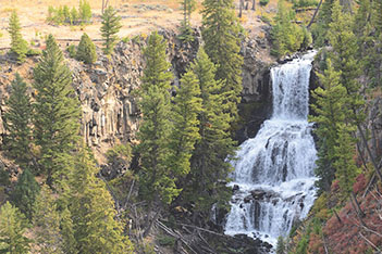 Choices cover image showing a waterfall cascading down vibrantly colored rocks